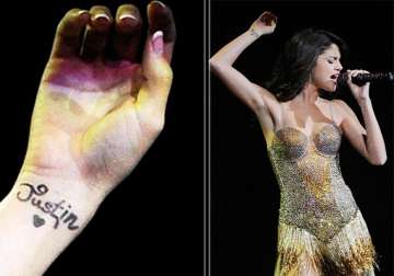 selena gomez gets a fake tattoo on her wrist