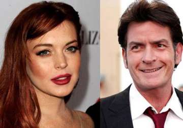 sheen payed lohan s tax outstanding