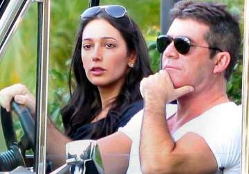 simon cowell takes lauren silverman to work see pics