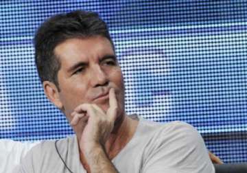 simon cowell to offer child support