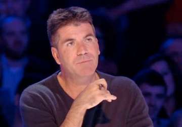 simon cowell to quit as judge on britain s got talent