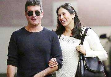 simon cowell lauren silverman heading to the hamptons