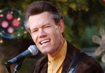 singer randy travis in critical condition