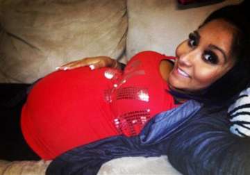 snooki put on make up before giving birth