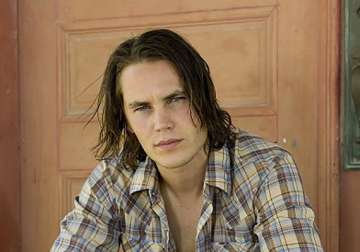 taylor kitsch gets his name up in lights