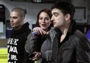 the wanted members check on lohan s health