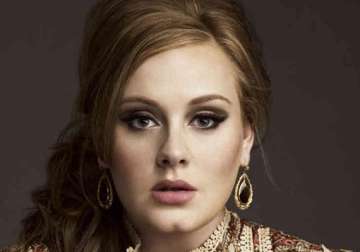 too young to write autobiography says adele