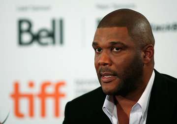 tyler perry offers support to boy in abuse case