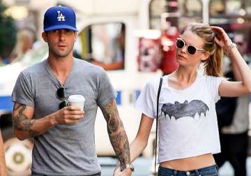 it s confirmed adam levine behati prinsloo to tie the knot in july