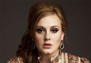 adele takes vacation before album release