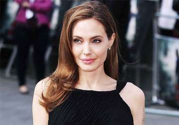 angelina jolie talks about her breast surgery says she is happy for the decision