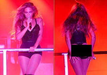 beyonce knowles shows her shapely buttocks in a revealing outfit see pics