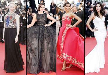 cannes 2014 sonam freida vs eva cate on the red carpet see pics