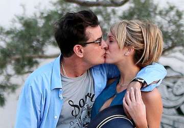 charlie sheen wants kids with brett rossi see pics