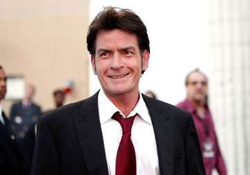charlie sheen s fiancee still married to another man