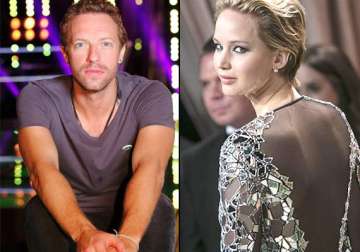 chris martin fell for jennifer lawrence s laid back personality