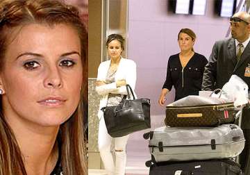 coleen rooney hits out at ba for ransacked luggage