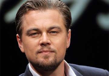 leonardo dicaprio challenged to buy nelson mandela s photo