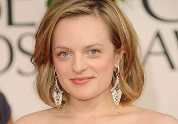 elisabeth moss compares acting with stripping