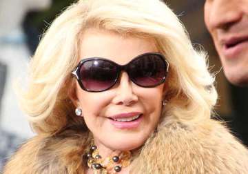 comedienne joan rivers in medically induced coma