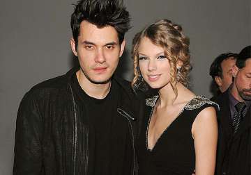 john mayer trying hard to win back taylor swift