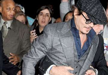 johnny depp punched by bodyguard