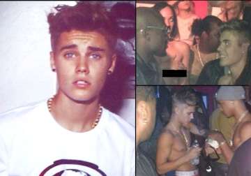shirtless justin bieber parties with topless stripper see pics