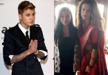 desi touch justin selena s indian jigs at separate events see pics