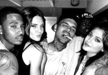 kendall and kylie jenner get cosy with bad boy chris brown see pics