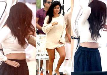 pregnant kourtney kardashian flaunts her baby bump and toned legs see pics