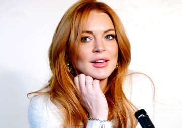 lindsay lohan to pen tell all book