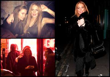 lindsay lohan spotted at a sex shop having a wild night out in london see pics