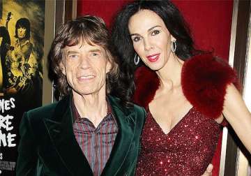 mick jagger devastated over girlfriend l wren scott s death rolling stones cancel the tour see pics