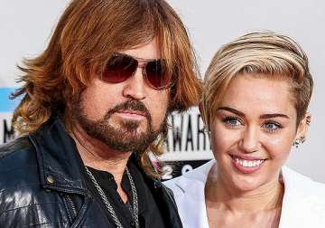 miley cyrus s dad plays matchmaker