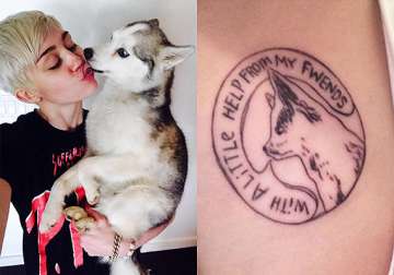 miley cyrus s new tattoo pays tribute to her late dog