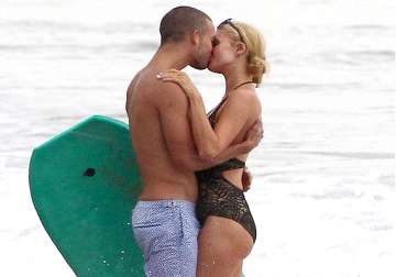 paris hilton kisses a man at beach not her boyfriend