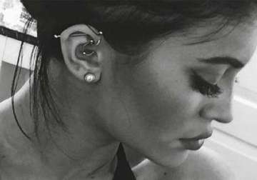 check out kylie jenner s new ear piercing