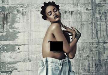 rihanna poses topless for magazine shoot