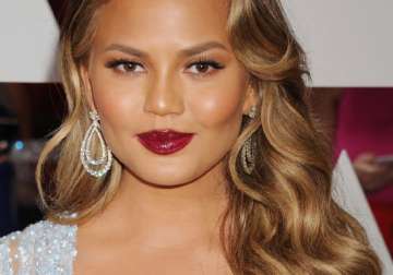 chrissy teigen says she won t hire hot nannies for babysitting