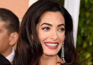 george clooney s stunning wife amal clooney set to cover vogue