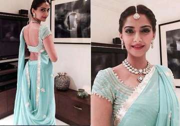 sonam kapoor looks lovely in an arresting blue lehenga at namrata soni s sangeet