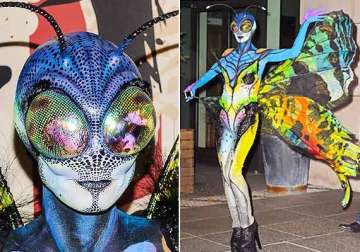 heidi klum becomes a butterfly at halloween looks terrific see pics