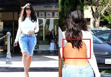omg is that spandex marks on kim s back view pics