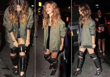 nicole scherzinger shows off wacky boots