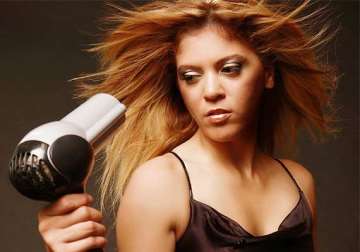 hair problems know how ironing or blow drying can harm