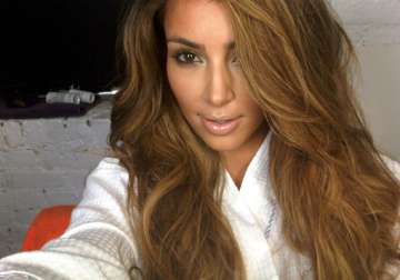 kim kardashian goes blonde view pics