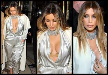 hidden secrets are they kim kardashian dons cleavage revealing top... again