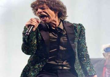 mick jagger flaunts jacket made of leaves