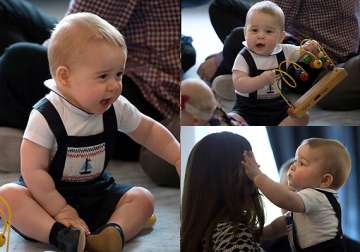 prince george turns playful on his first official public interaction see pics