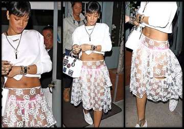 rihanna dares to bare flaunts pink knickers in see through skirt see pics